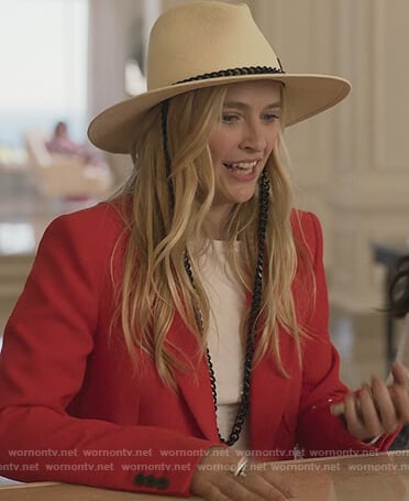 Camille’s white straw hat on Emily in Paris