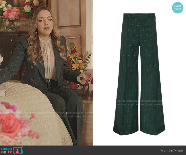 Gucci Pinstripe Flared Trousers worn by Fallon Carrington (Elizabeth Gillies) on Dynasty