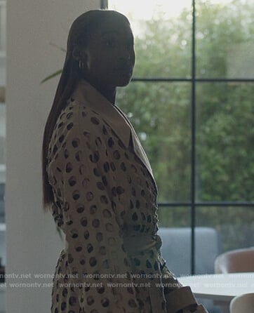 Issa’s hole cut outs trench coat on Insecure