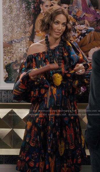 Lisa’s black printed off shoulder dress on And Just Like That