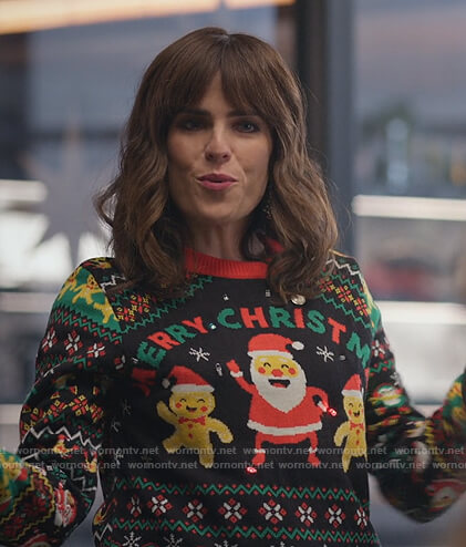 Mariana’s black Christmas LED sweater on Home Economics