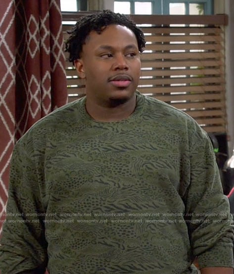 Marty’s green animal print sweatshirt on The Neighborhood
