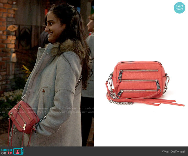 Rebecca Minkoff Moto Leather Camera Crossbody Bag in Grapefruit worn by Bela Malhotra (Amrit Kaur) on The Sex Lives of College Girls