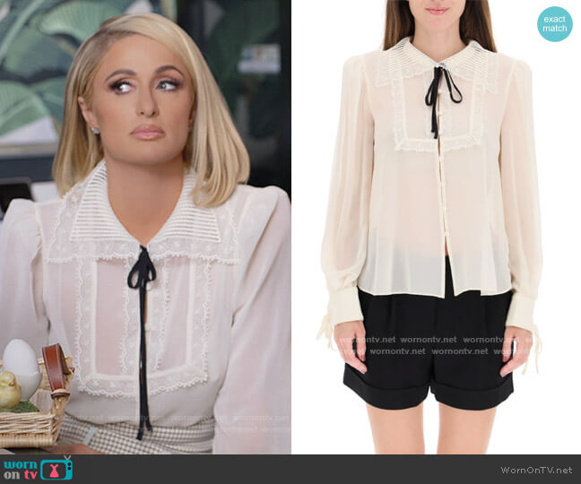 Self Portrait Lace Bib Blouse worn by Paris Hilton on Paris in Love