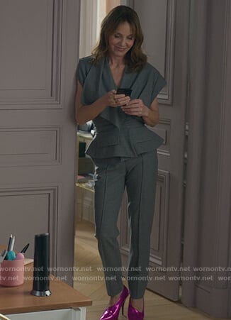 Sylvie’s gray trench vest and pants on Emily in Paris