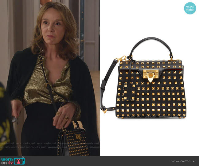 Valentino Garavani Small Alcove Rockstud Leather Top Handle Bag worn by Sylvie (Philippine Leroy-Beaulieu) on Emily in Paris
