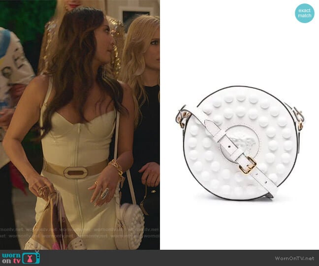 Versace La Medusa round camera bag worn by Mindy Chen (Ashley Park) on Emily in Paris
