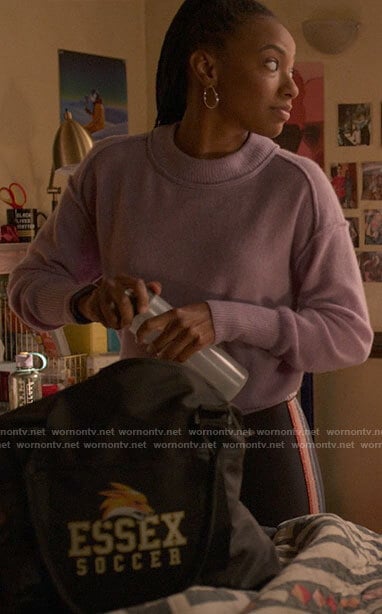 Whitney’s purple sweater and rainbow stripe leggings on The Sex Lives of College Girls