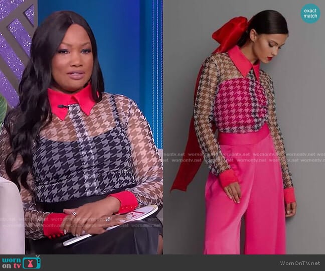 Kaftan Studio Houndstooth Sheer Blouse worn by Garcelle Beauvais on The Real