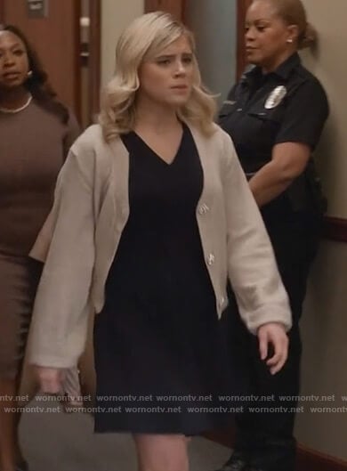 Madison’s beige cardigan with embellished buttons on Queens
