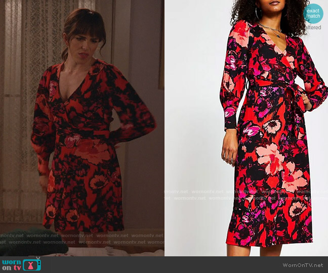 River Island Floral Print Wrap Midi Dress in red worn by Marina (Karla Souza) on Home Economics