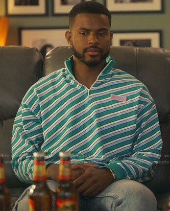 Aaron’s green diagonal stripe sweatshirt on Grown-ish