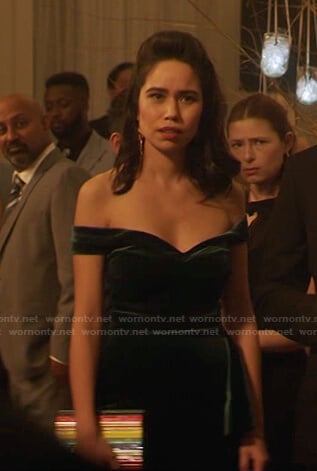 Addy’s green off-shoulder velvet dress on Nancy Drew