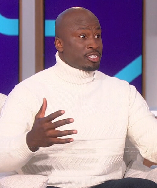 Akbar’s white turtleneck sweater on The Talk
