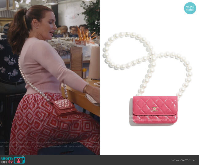 Chanel Lambskin clutch with pearls and chain worn by Charlotte York (Kristin Davis) on And Just Like That