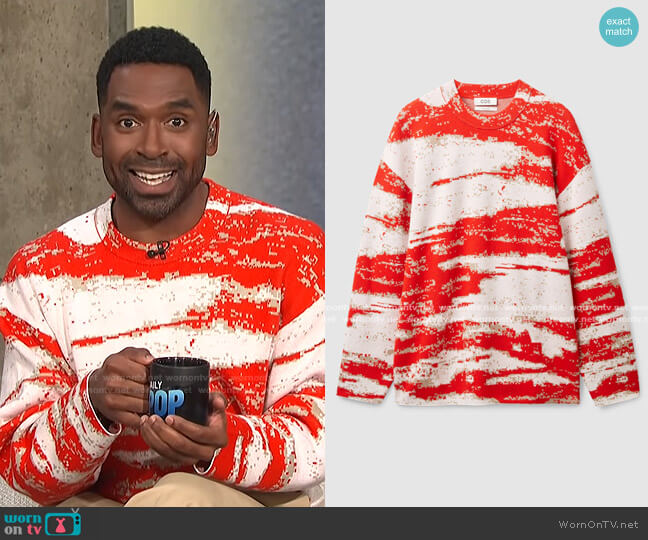 Cos Relaxed-Fit Graphic Sweater worn by Justin Sylvester on E! News
