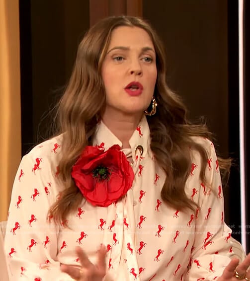 Drew’s white horse print tie neck blouse on The Drew Barrymore Show