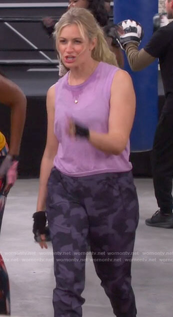 Gemma’s lilac tank top and camo pants on The Neighborhood