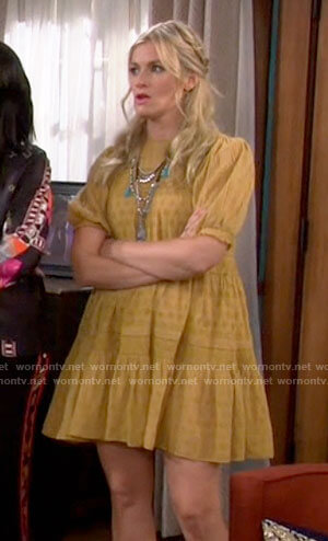 Gemma’s yellow puff sleeve mini dress on The Neighborhood