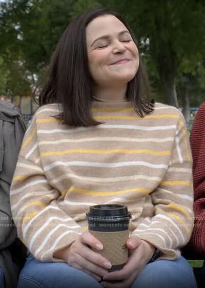Jodie’s beige and yellow striped sweater on Pivoting
