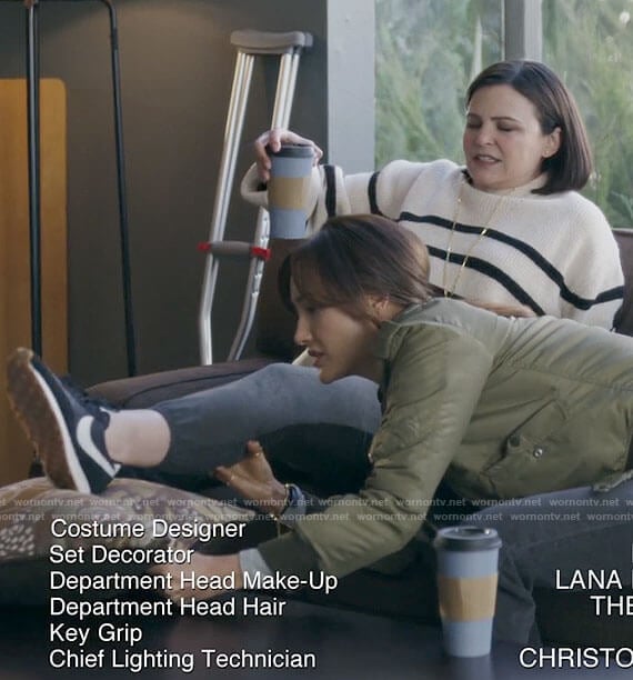 Jodie’s striped sweater and black Nike sneakers on Pivoting