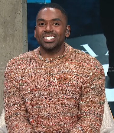 Justin’s brown cable knit sweater on E! News Daily Pop
