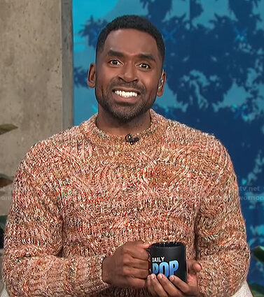 Justin’s brown cable knit sweater on E! News Daily Pop