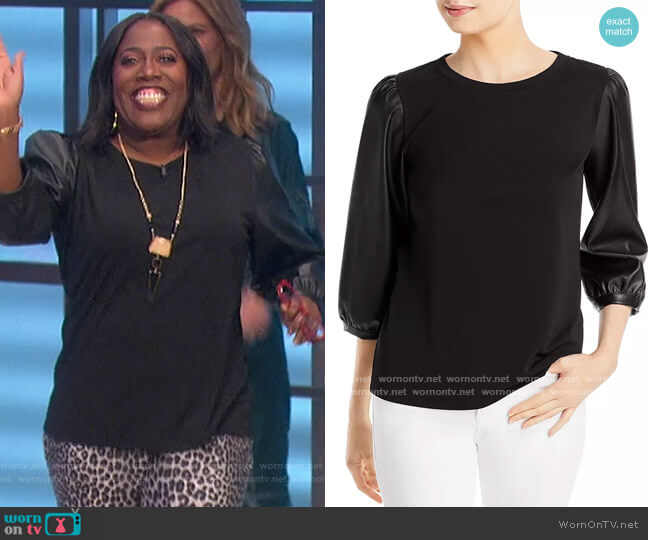 Karl Lagerfeld Faux Leather Sleeve Top worn by Sheryl Underwood on The Talk