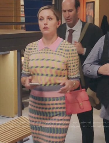 Tami’s printed short sleeve sweater and skirt on Kenan