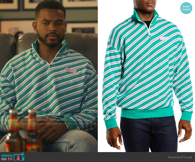 Lacoste Striped Quarter Zip Sweatshirt worn by Aaron Jackson (Trevor Jackson) on Grown-ish
