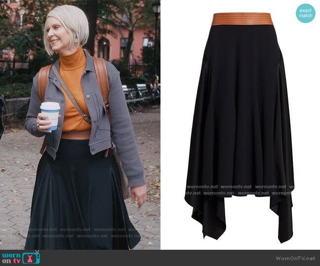 Loewe Leather Waistband Asymmetric Midi Skirt worn by Miranda Hobbs (Cynthia Nixon) on And Just Like That