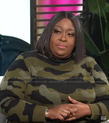 Loni’s camo turtleneck sweater on E! News Daily Pop