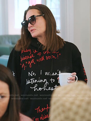 Meredith’s black cursive print hoodie on The Real Housewives of Salt Lake City