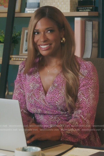 Mika’s pink animal print wrap blouse on Kenan