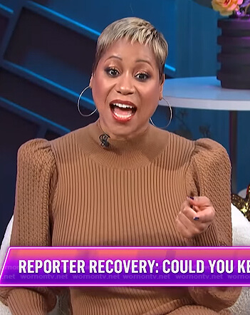 Monique’s brown ribbed puff sleeve sweater dress on E! News Nightly Pop