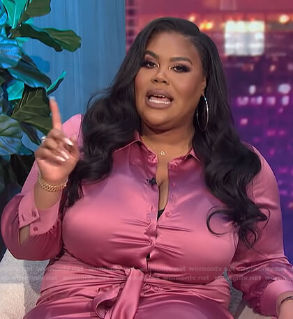 Nina’s pink tie waist satin shirtdress on E! News Nightly Pop