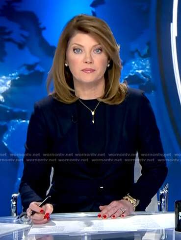 Norah’s navy belted blazer on CBS Evening News