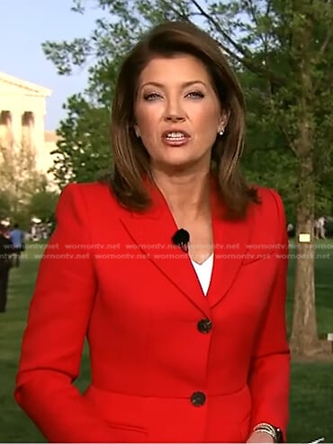 Norah’s red peplum blazer on CBS Evening News