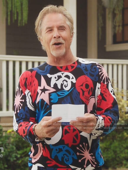 Rick’s black printed sweater on Kenan