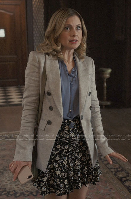 Sam’s grey blazer, blue blouse and floral skirt on Ghosts