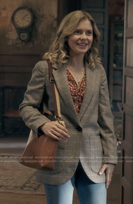 Sam’s grey checked blazer and floral top on Ghosts