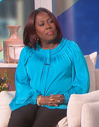 Sheryl’s blue braided trim blouse on The Talk