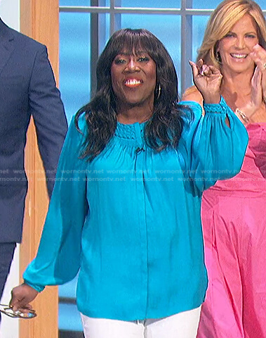 Sheryl’s blue braided trim blouse on The Talk