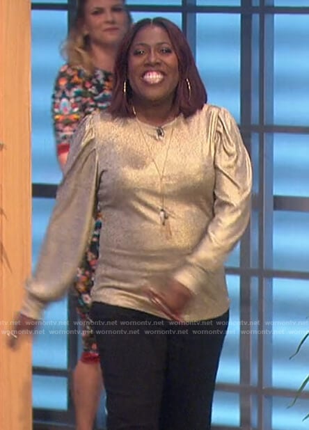 Sheryl’s gold metallic top on The Talk