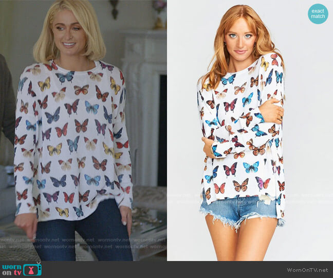 Show me your Mumu Bonfire Sweater with Butterflies worn by Paris Hilton on Paris in Love