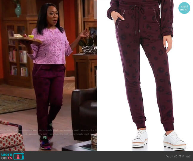 Splendid Black Cherry Leopard Joggers worn by Tina Butler (Tichina Arnold) on The Neighborhood
