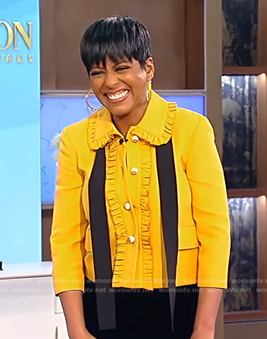 Tamron’s yellow ruffle contrast tie neck jacket on Tamron Hall Show
