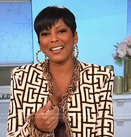 Tamron’s monogram print fringe jacket on Tamron Hall Show