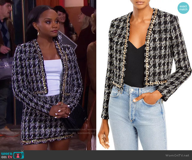 WornOnTV: Chanel's black chain detail tweed jacket and skirt