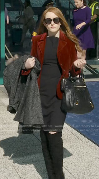 Anna’s red velvet jacket and black sheath dress on Inventing Anna